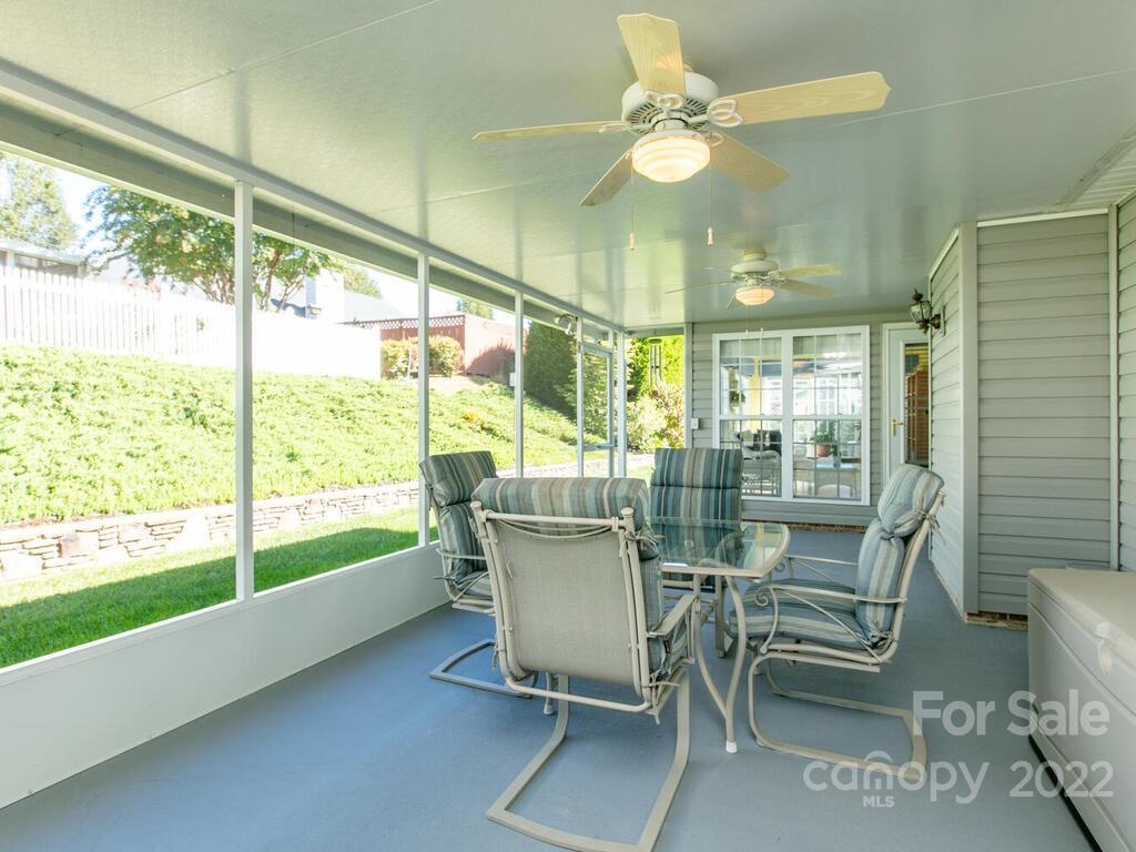 294 Farm Valley Road Fletcher, NC 28732 - Photo 33 of 36 a view of a dining room with furniture window and outside view