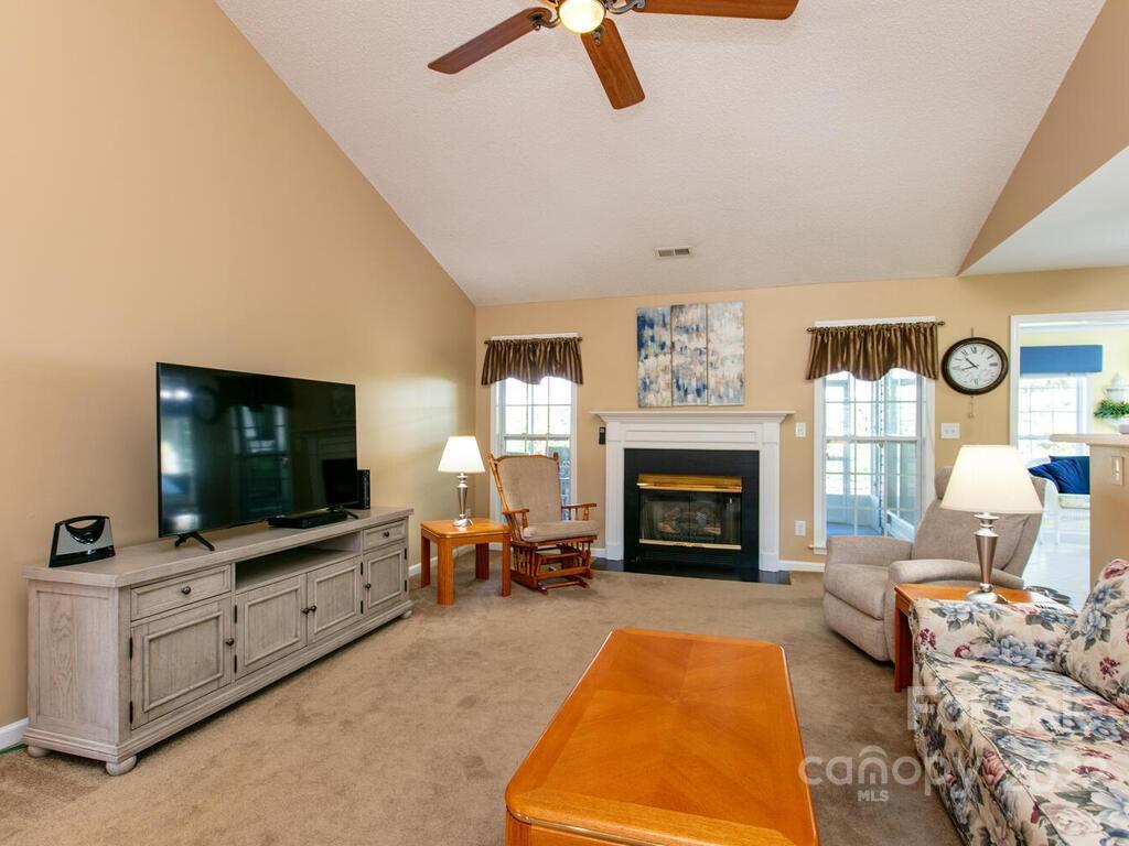 294 Farm Valley Road Fletcher, NC 28732 - Photo 4 of 36 a living room with furniture and a fireplace