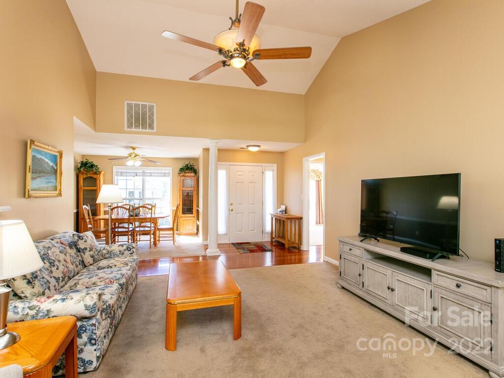 294 Farm Valley Road Fletcher, NC 28732 - Photo 5 of 36 a living room with furniture and a flat screen tv