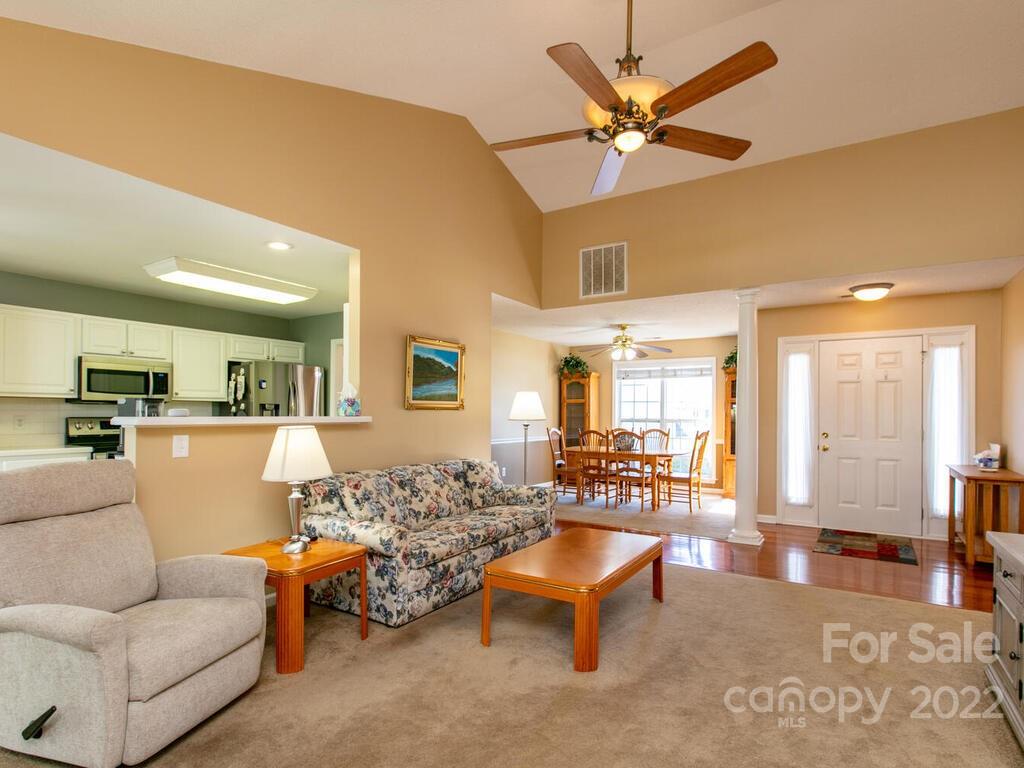 294 Farm Valley Road Fletcher, NC 28732 - Photo 6 of 36 a living room with furniture and a large window