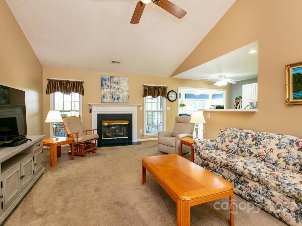 294 Farm Valley Road Fletcher, NC 28732 - Photo 7 of 36 a living room with furniture and a fireplace
