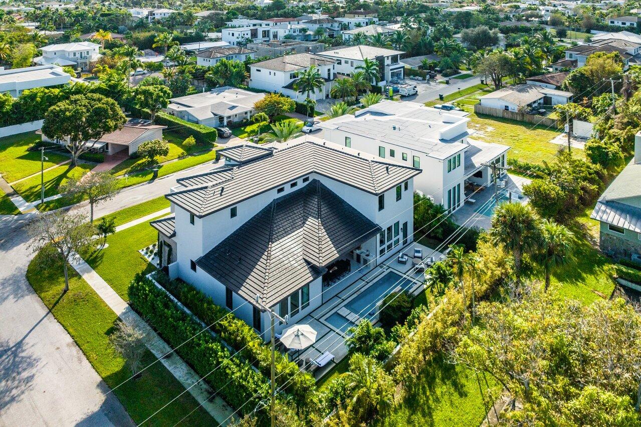1099 Northeast 2nd Terrace Boca Raton, FL 33432 - Photo 41 of 43 an aerial view of residential house with outdoor space and swimming pool