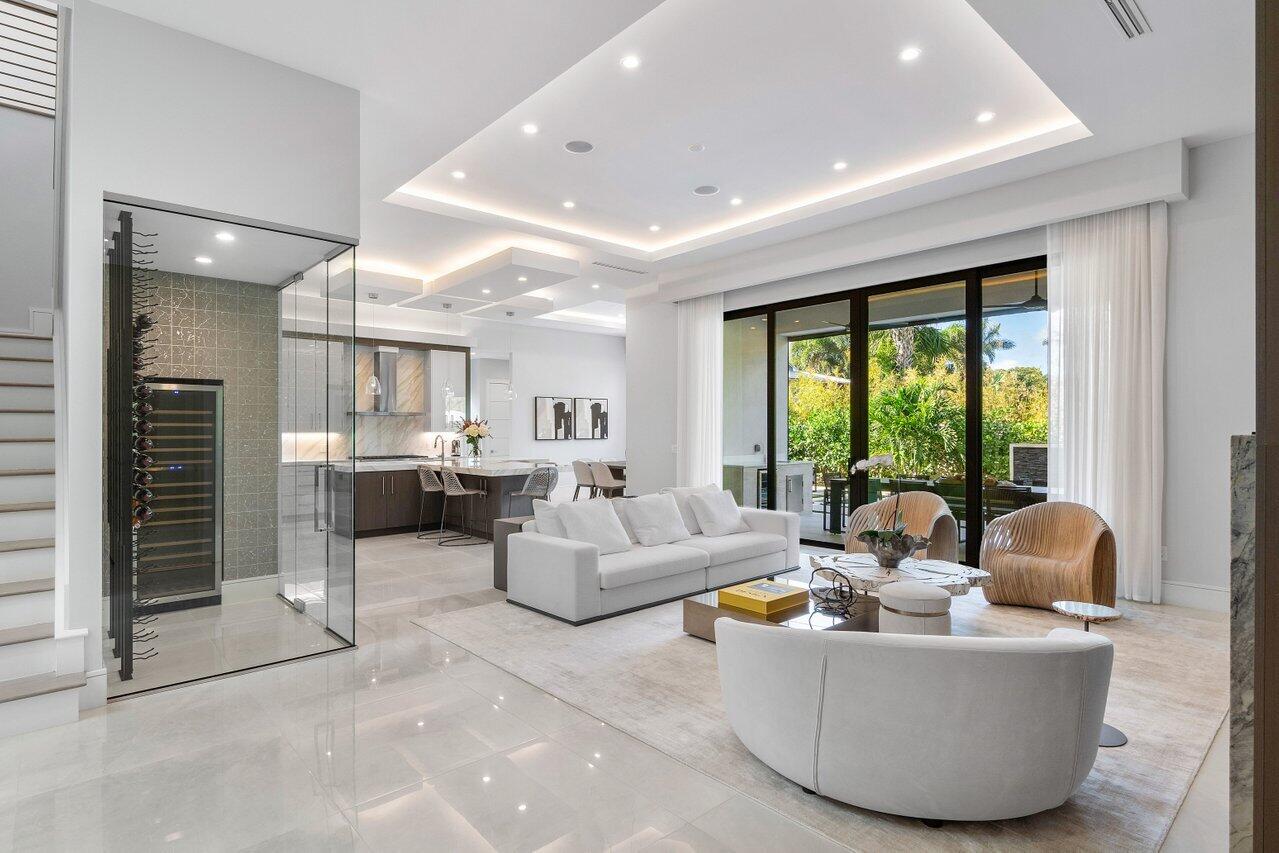 1099 Northeast 2nd Terrace Boca Raton, FL 33432 - Photo 5 of 43 a living room with furniture and a large window