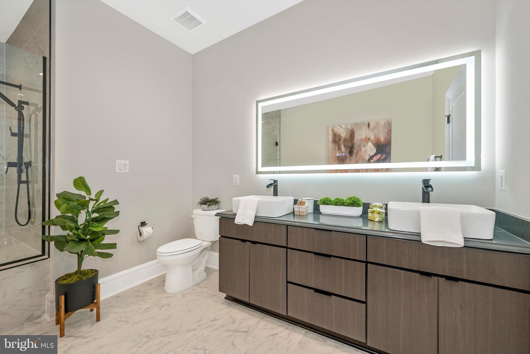 424 North Maxwell Avenue Frederick, MD 21701 - Photo 31 of 58 Primary Bathroom with Backlit LED Mirror