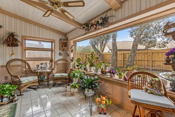 a very nice looking living room with a large window