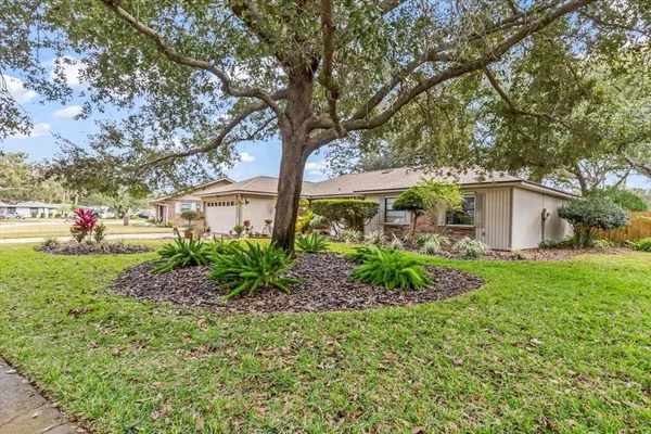 a house with a yard and a garden