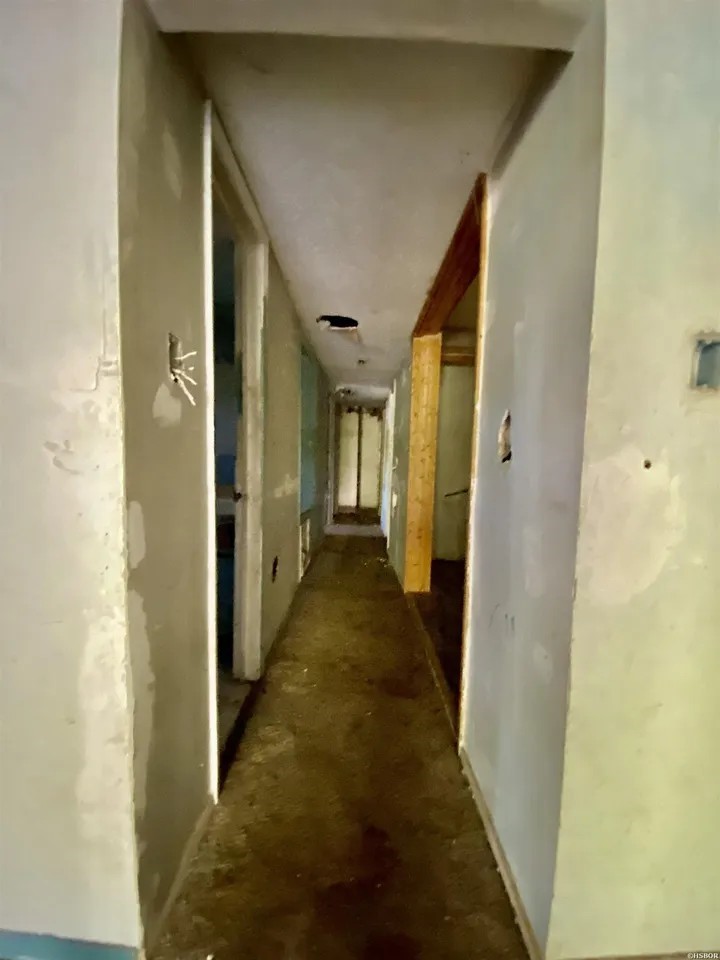 111 Shadow Terrace Hot Springs, AR 71901 - Photo 14 of 21 a view of a hallway with wooden shelves