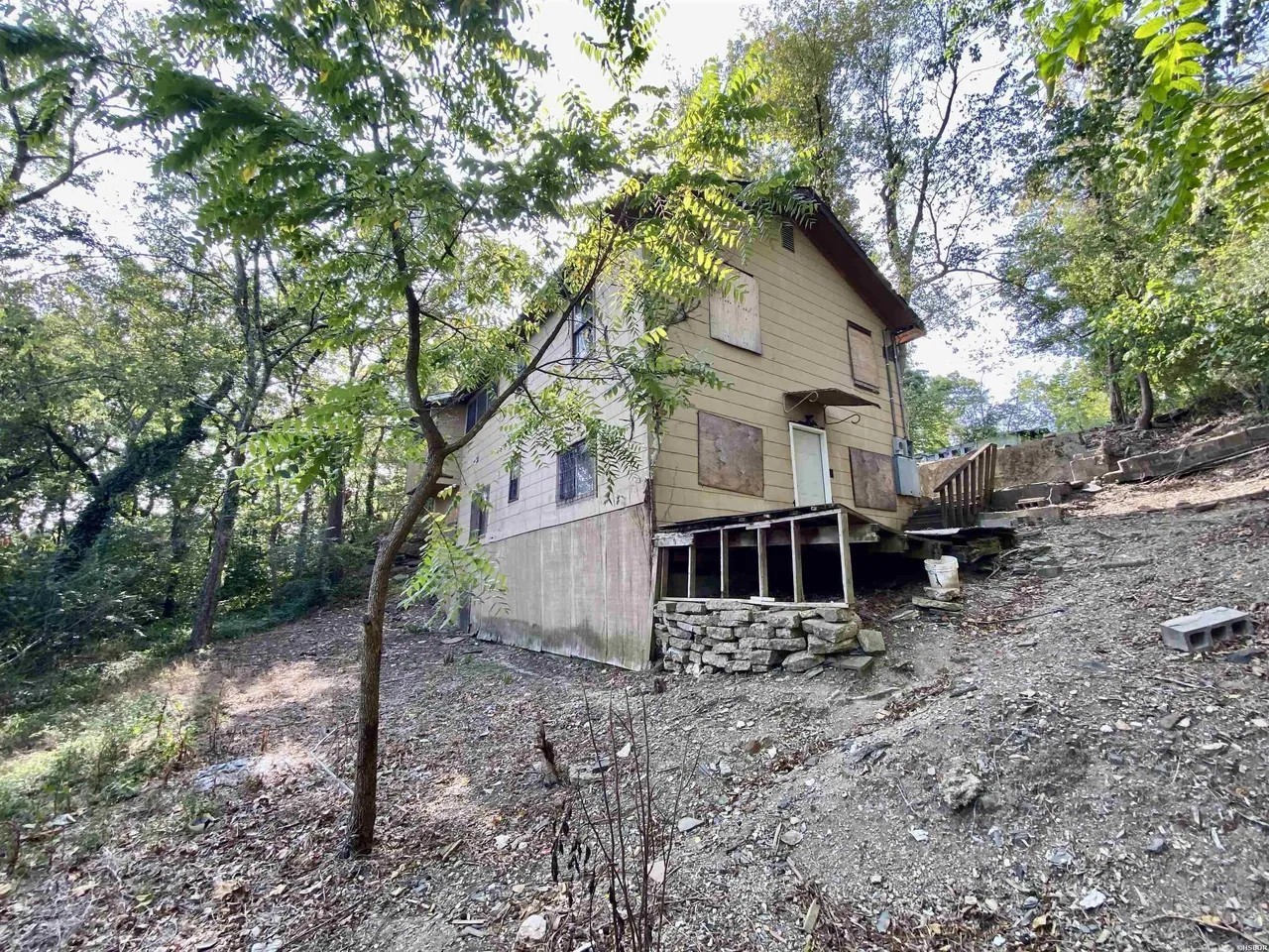 111 Shadow Terrace Hot Springs, AR 71901 - Photo 20 of 21 a view of a house with a yard