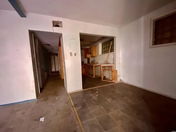 a view of a livingroom with a staircase