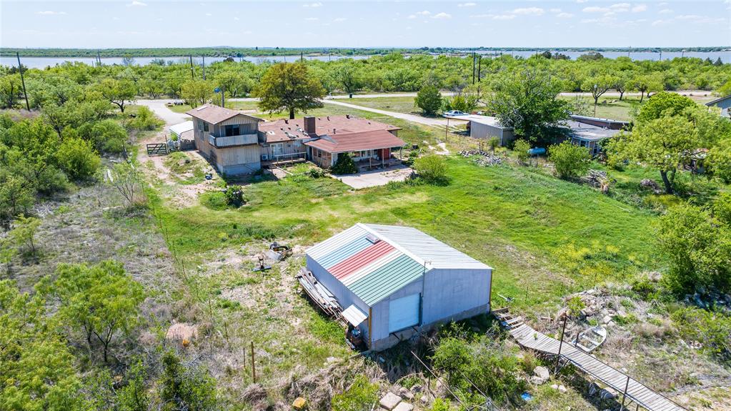 36 Poverty Point Circle Abilene, TX 79601 - Photo 27 of 31 a view of a house with a yard and a pool