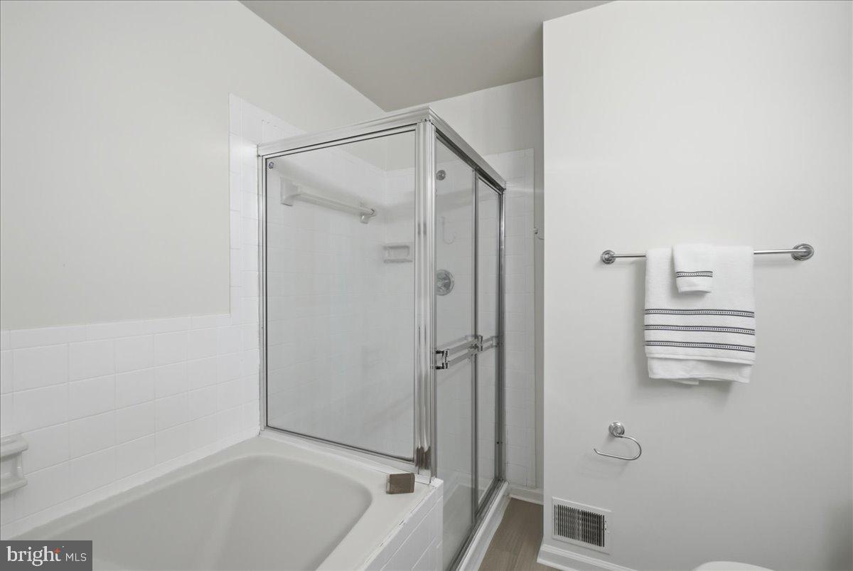 8902 Winding Hollow Way Springfield, VA 22152 - Photo 16 of 34 Updated bath with walk-in shower.