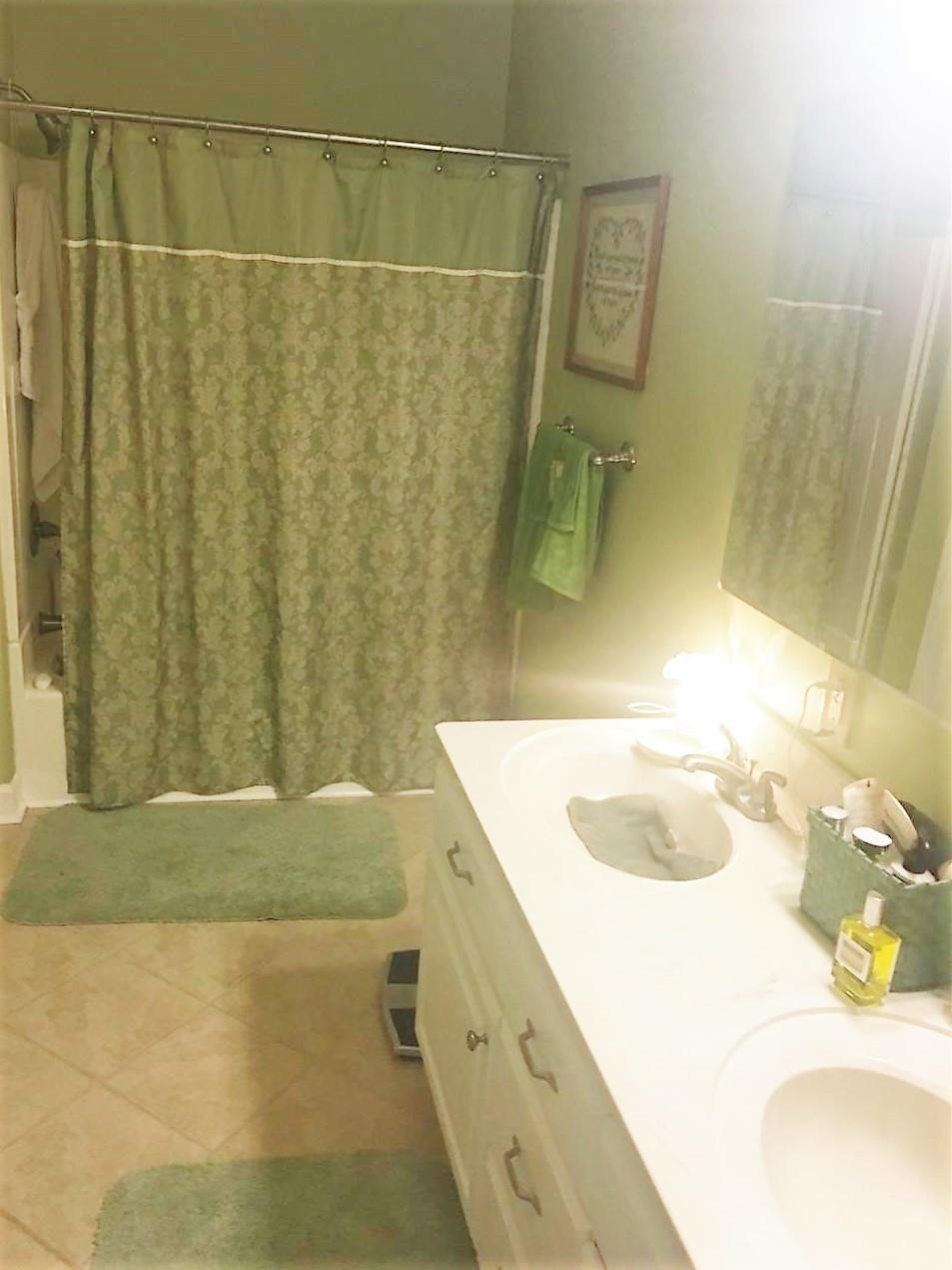 3797 Summitville Road Manchester, TN 37355 - Photo 6 of 10 a bathroom with a sink and a shower