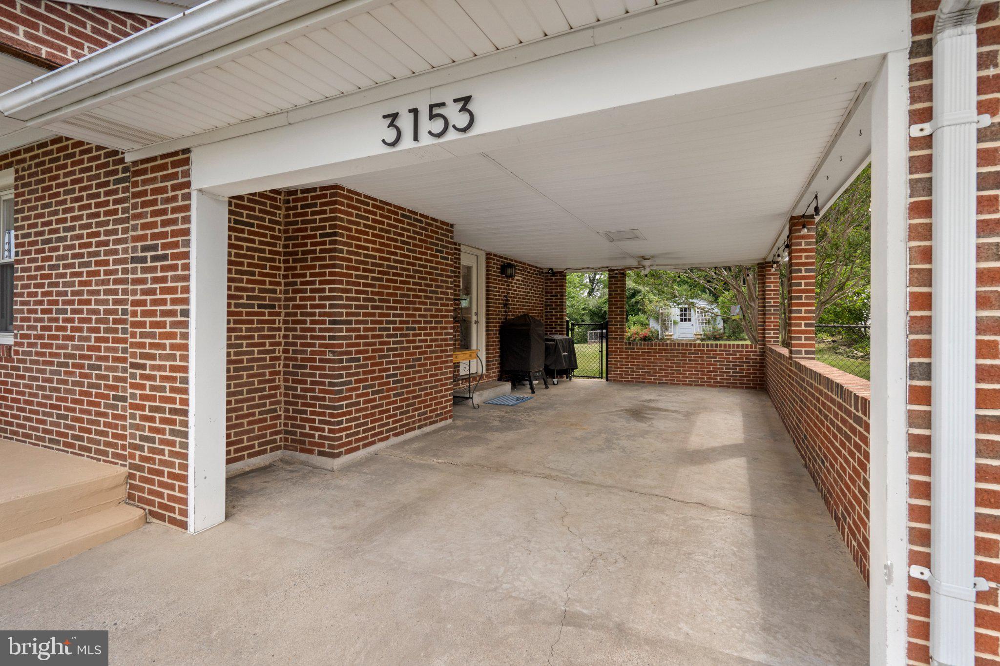 3153 Charles Town Road Kearneysville, WV 25430 - Photo 18 of 29 Charming carport with brick accents.