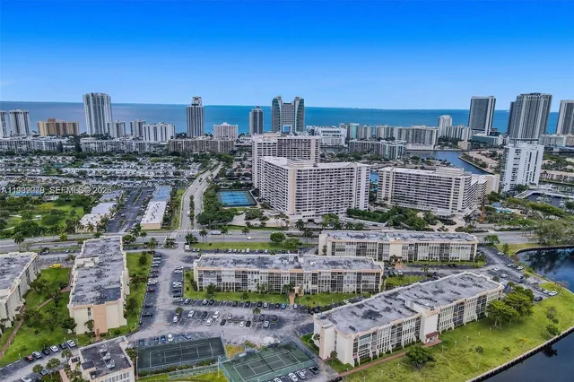 a view of a city with tall buildings