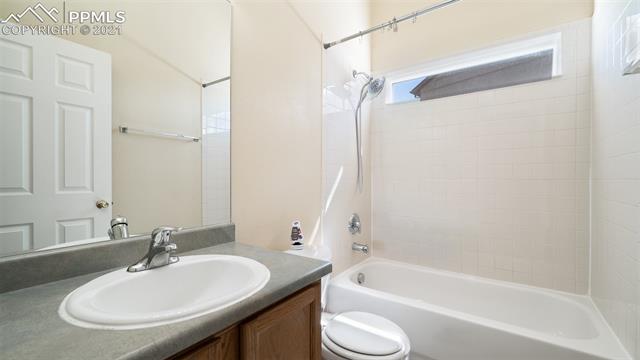 9061 Tompkins Road Peyton, CO 80831 - Photo 15 of 27 main level bedroom
