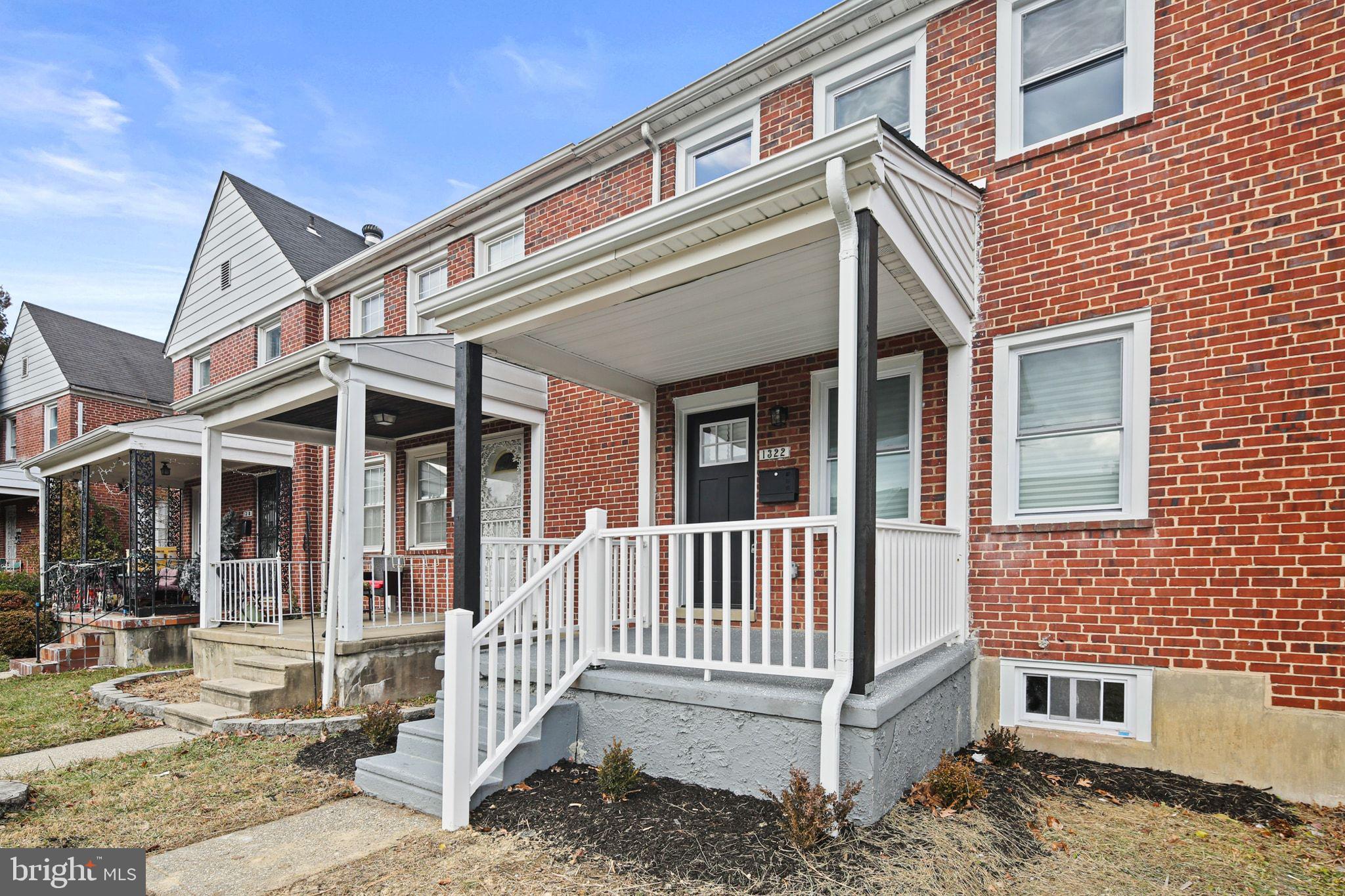 1322 Kitmore Road Baltimore, MD 21239 - Photo 1 of 34 a front view of a house with a porch