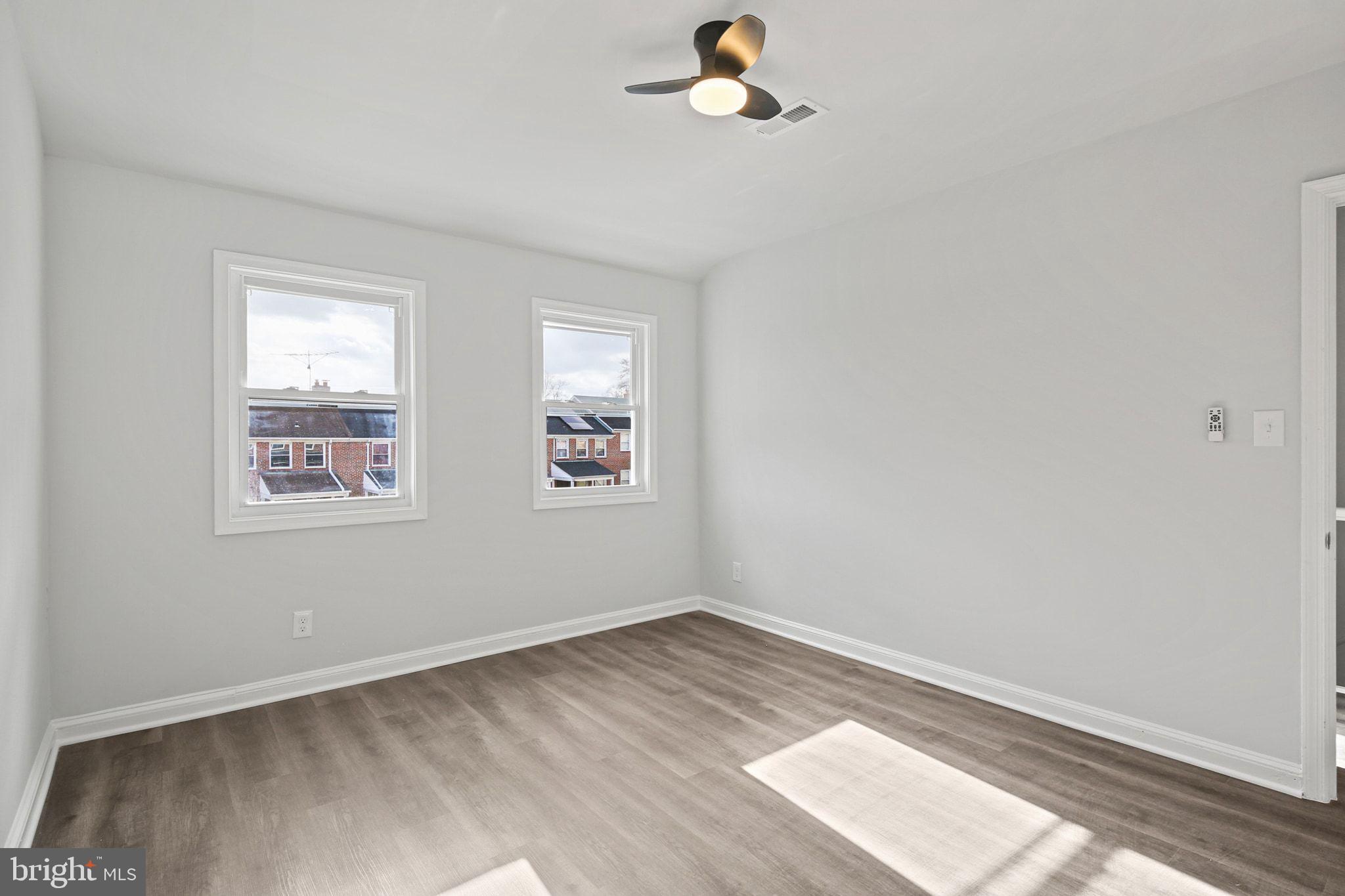1322 Kitmore Road Baltimore, MD 21239 - Photo 17 of 34 an empty room with a window
