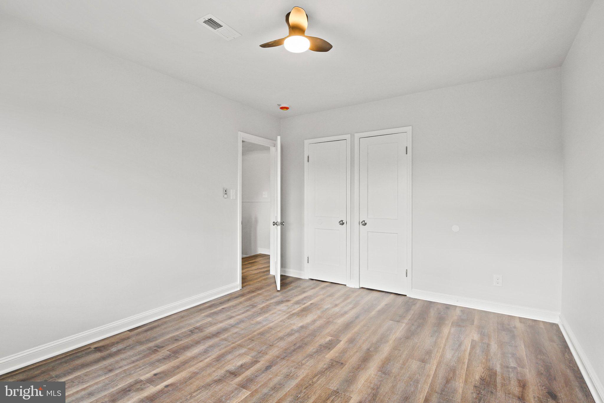 1322 Kitmore Road Baltimore, MD 21239 - Photo 18 of 34 a view of a livingroom with wooden floor