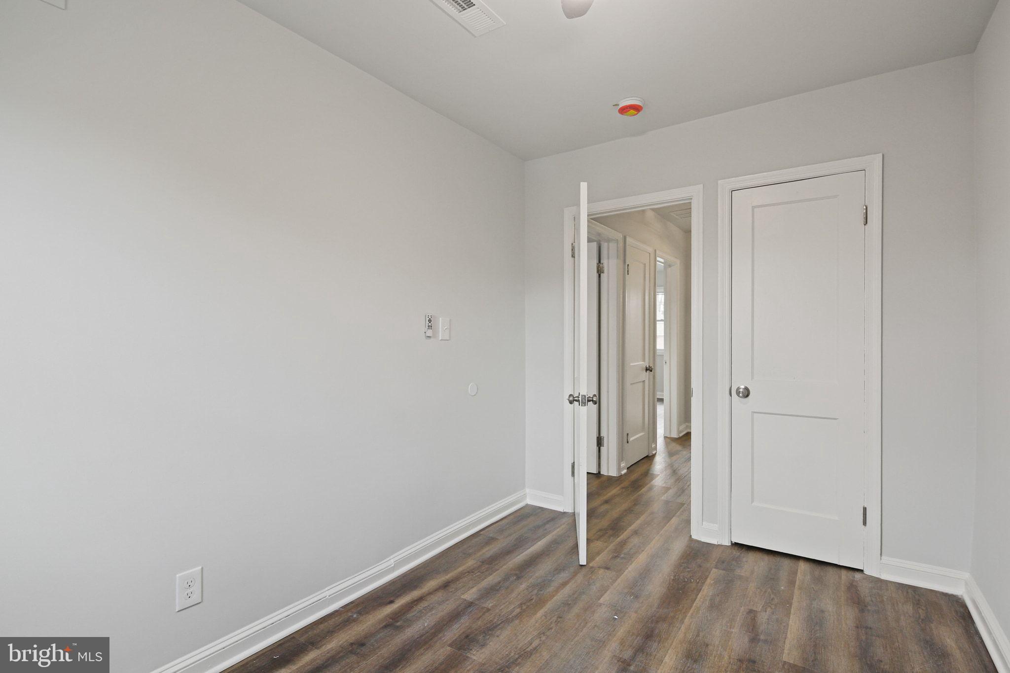 1322 Kitmore Road Baltimore, MD 21239 - Photo 22 of 34 a view of an empty room