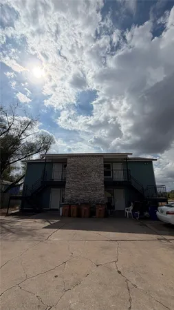 a car parked in front of a house
