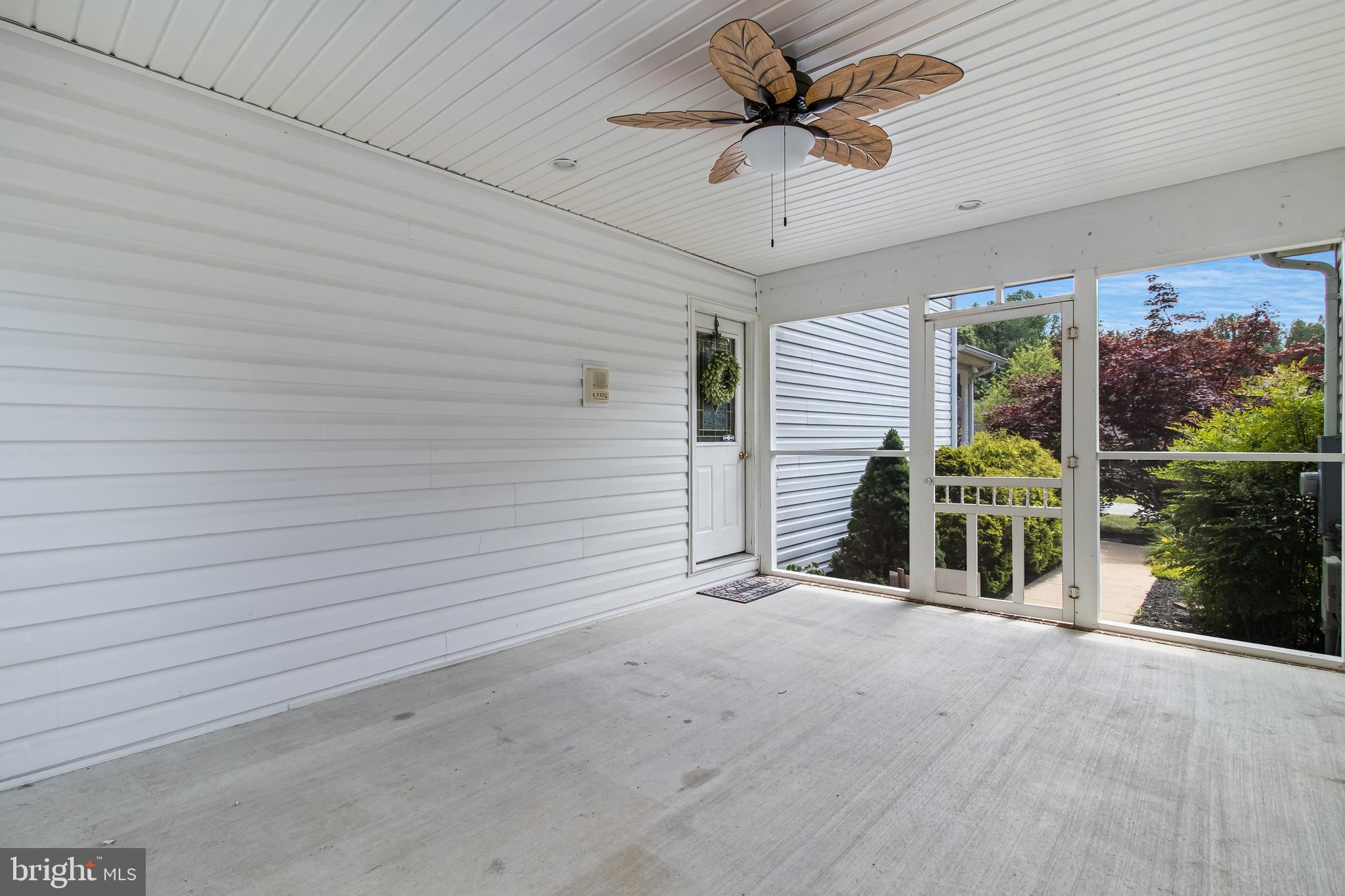 203 Morgans Ridge Court La Plata, MD 20646 - Photo 8 of 59 a view of a deck with wooden floor and backyard of a house