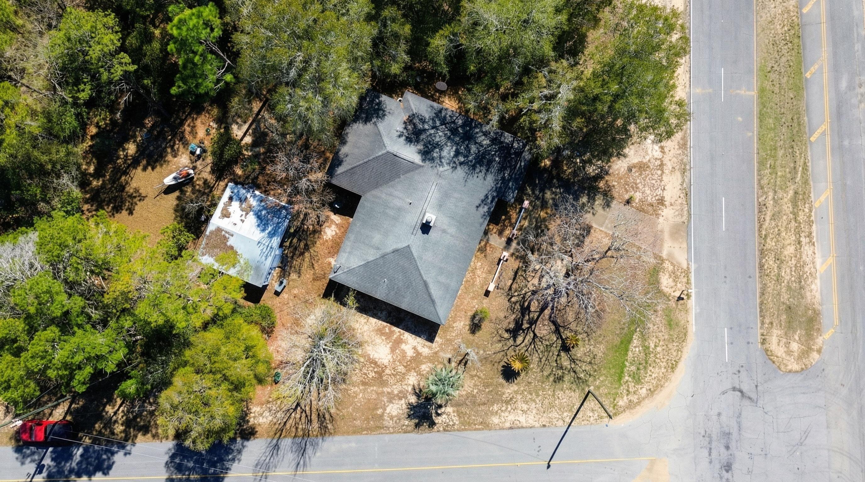 4335 Country Club Boulevard Chipley, FL 32428 - Photo 26 of 28 view of a house with a tree
