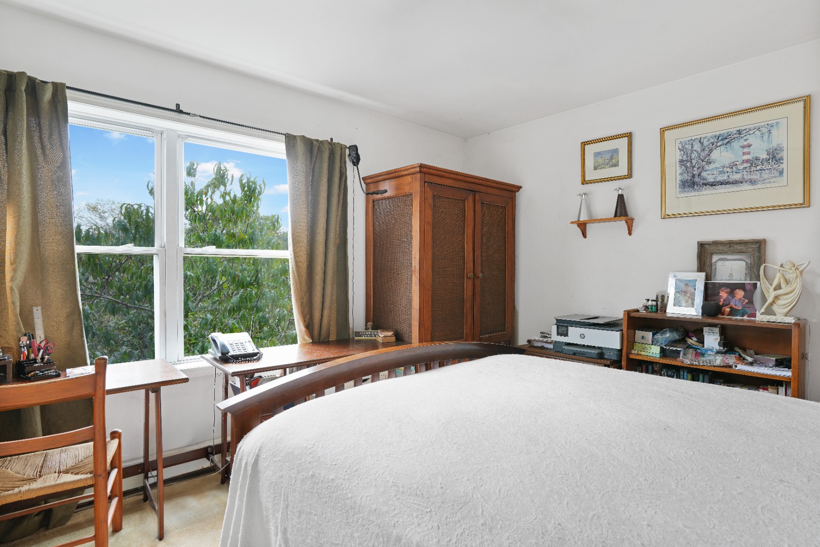 7 Martha's Way Edgartown, MA 02539 - Photo 12 of 13 a bedroom with a bed and a large window