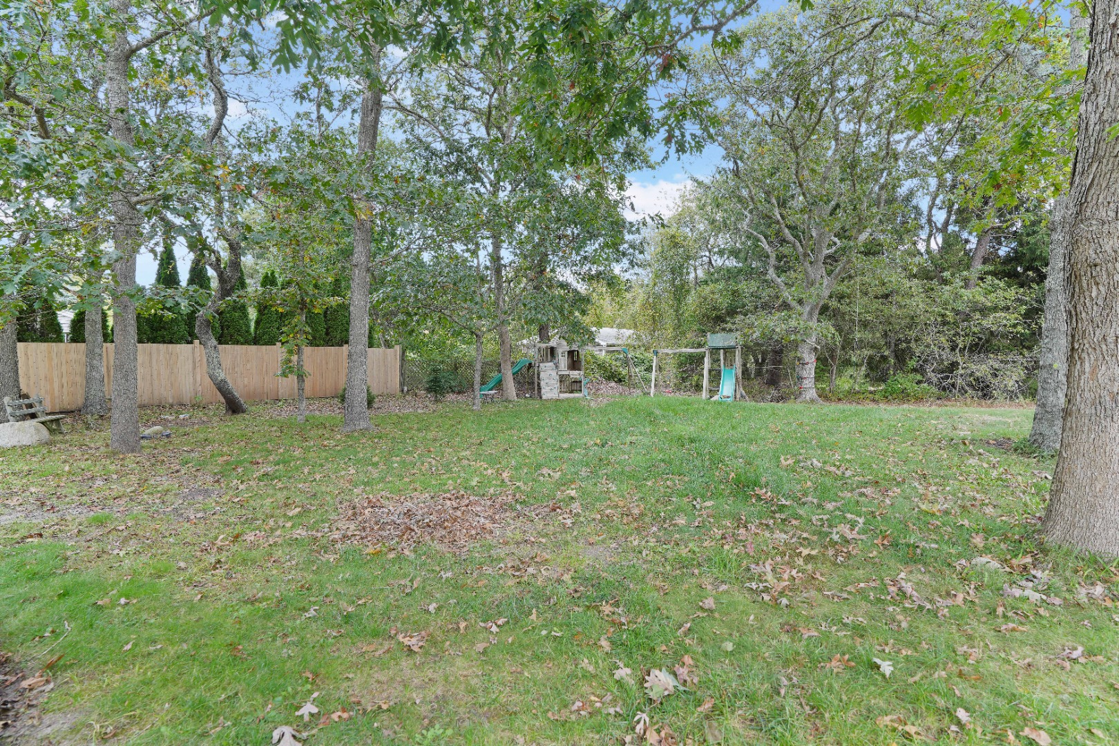 7 Martha's Way Edgartown, MA 02539 - Photo 5 of 13 a view of a yard with a large tree