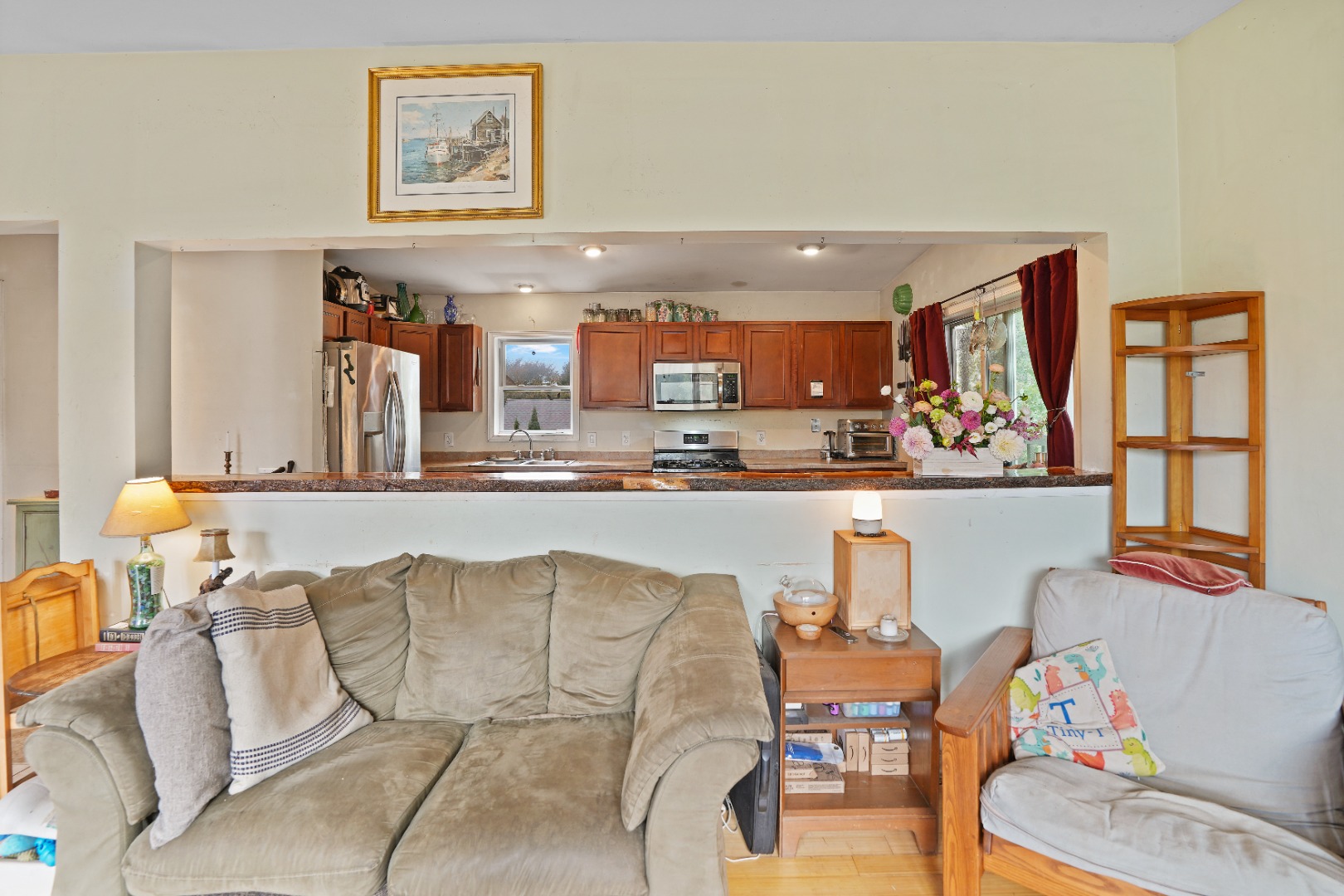 7 Martha's Way Edgartown, MA 02539 - Photo 9 of 13 a living room with furniture and kitchen view