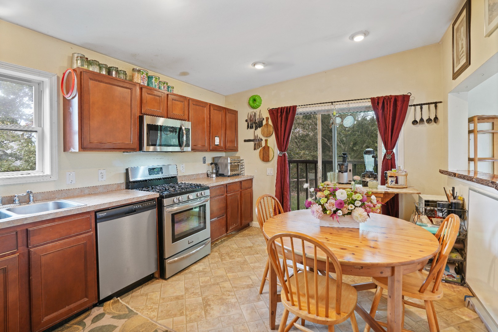7 Martha's Way Edgartown, MA 02539 - Photo 10 of 13 a kitchen with a sink stove and microwave