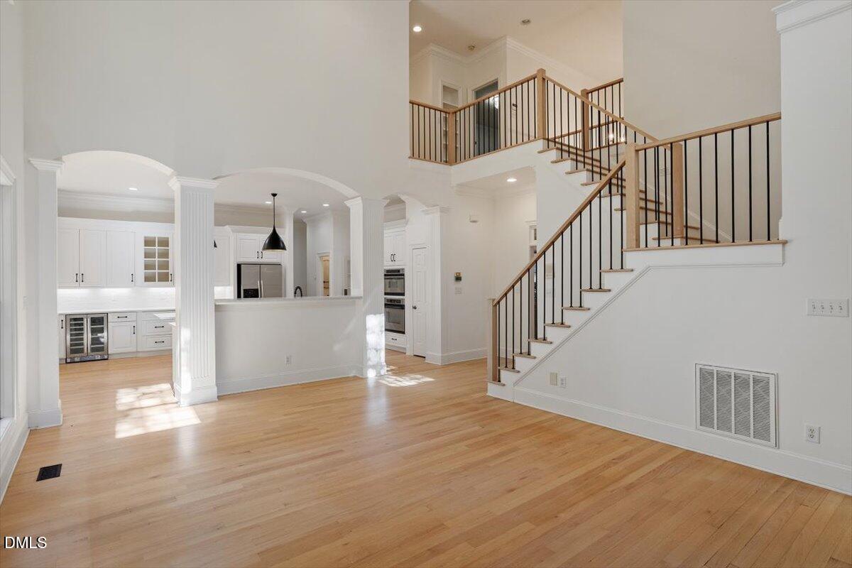 7009 Potomac Court Raleigh, NC 27613 - Photo 19 of 49 a view of entryway and hall with wooden floor
