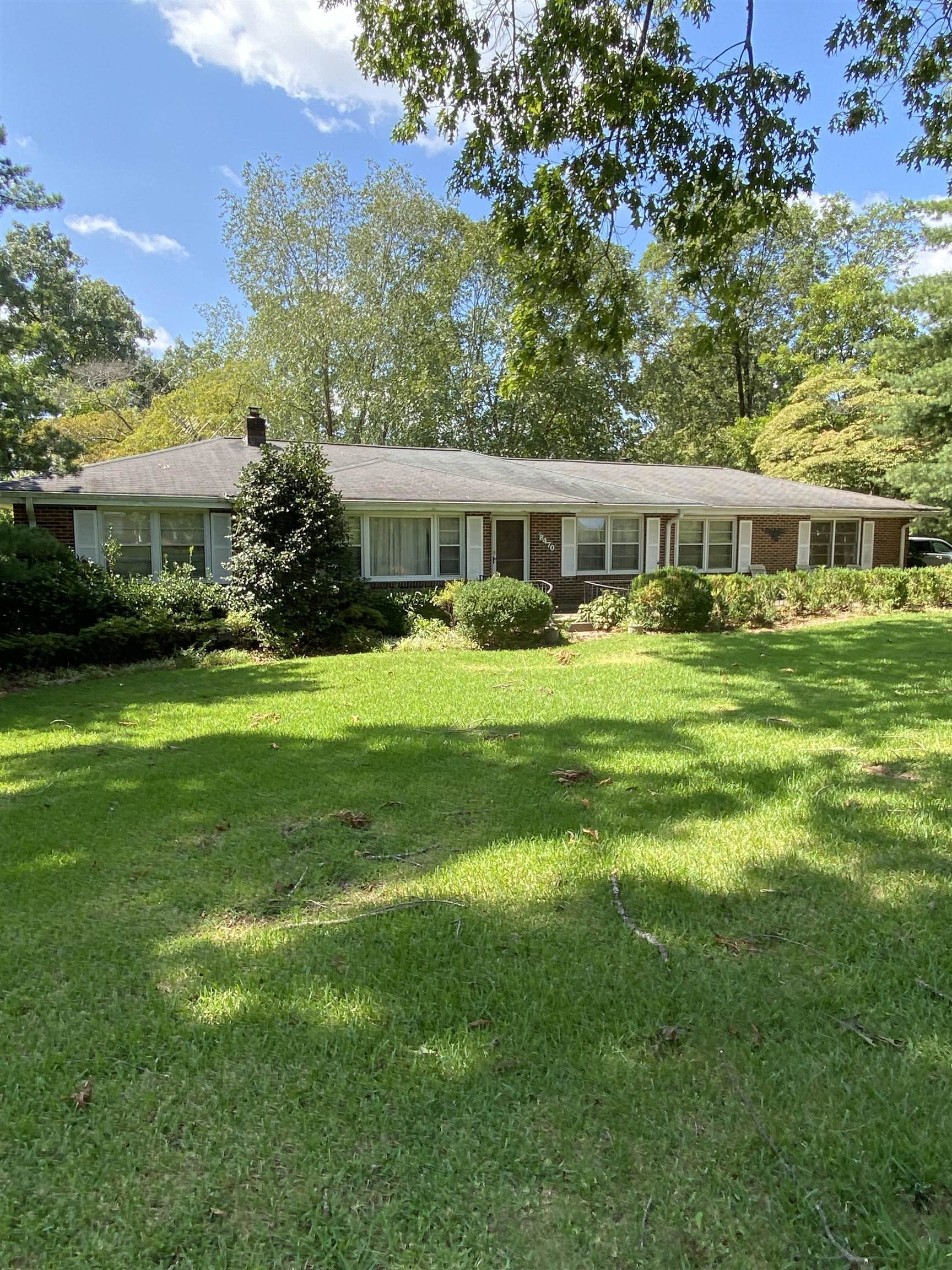 8470 Rivertown Road Fairburn, GA 30213 - Photo 1 of 1 a front view of house with yard and green space