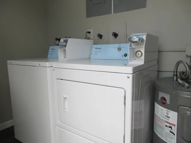 a utility room with dryer and washer
