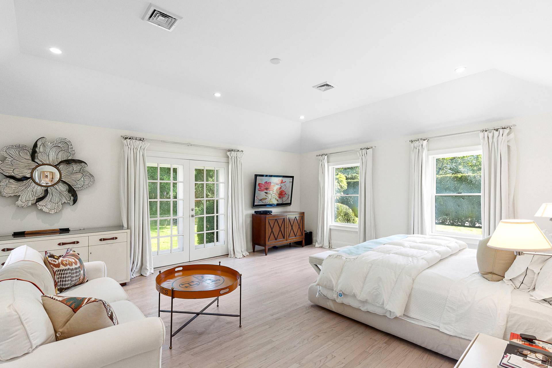 1 Egypt Close East Hampton, NY 11937 - Photo 17 of 38 a bedroom with a bed and a couch