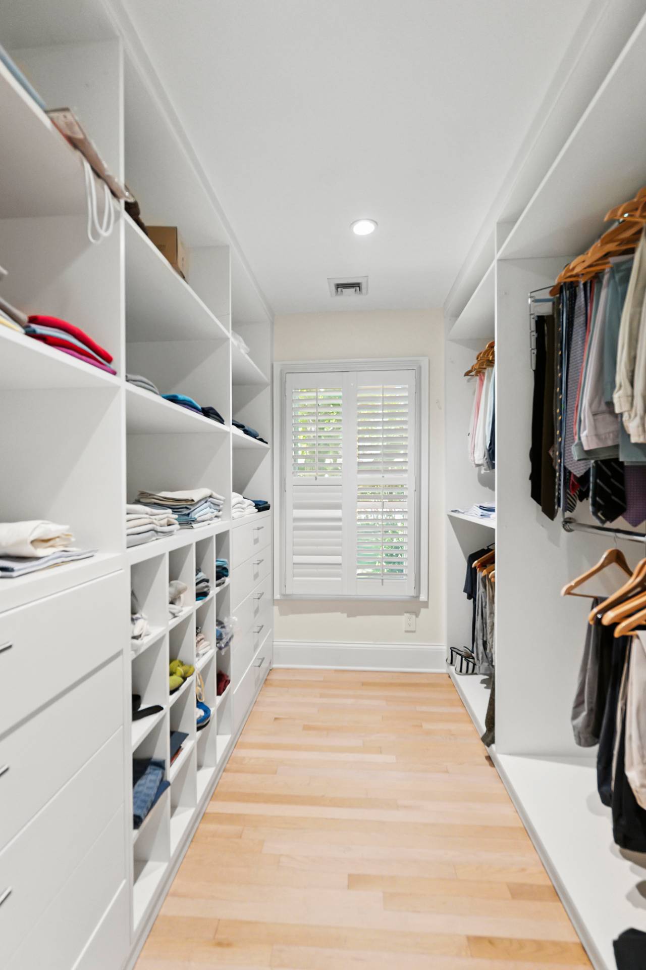 1 Egypt Close East Hampton, NY 11937 - Photo 18 of 38 a walk in closet with wooden floor and a window
