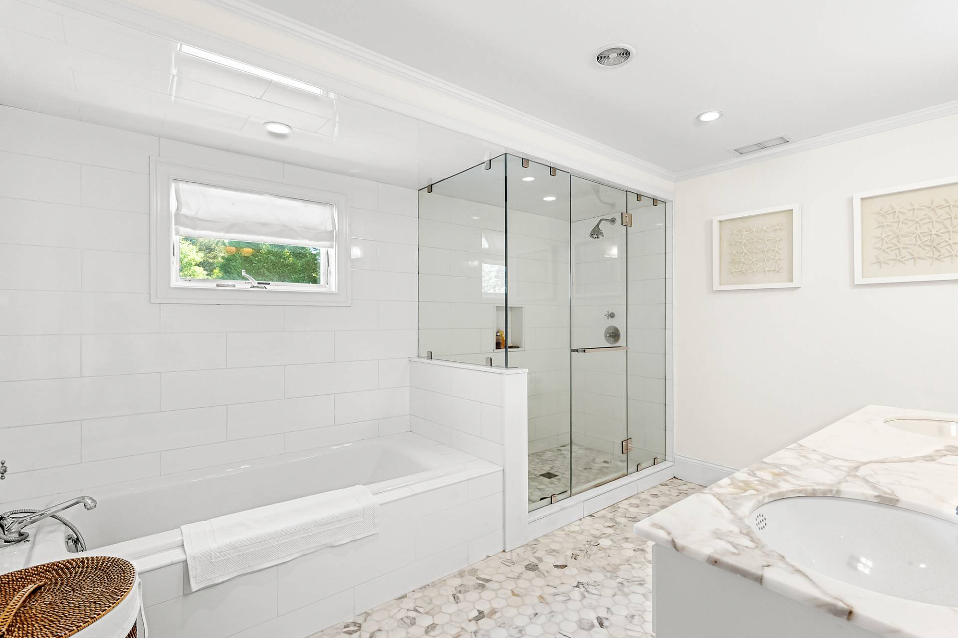 1 Egypt Close East Hampton, NY 11937 - Photo 19 of 38 a bathroom with a tub a sink and a shower