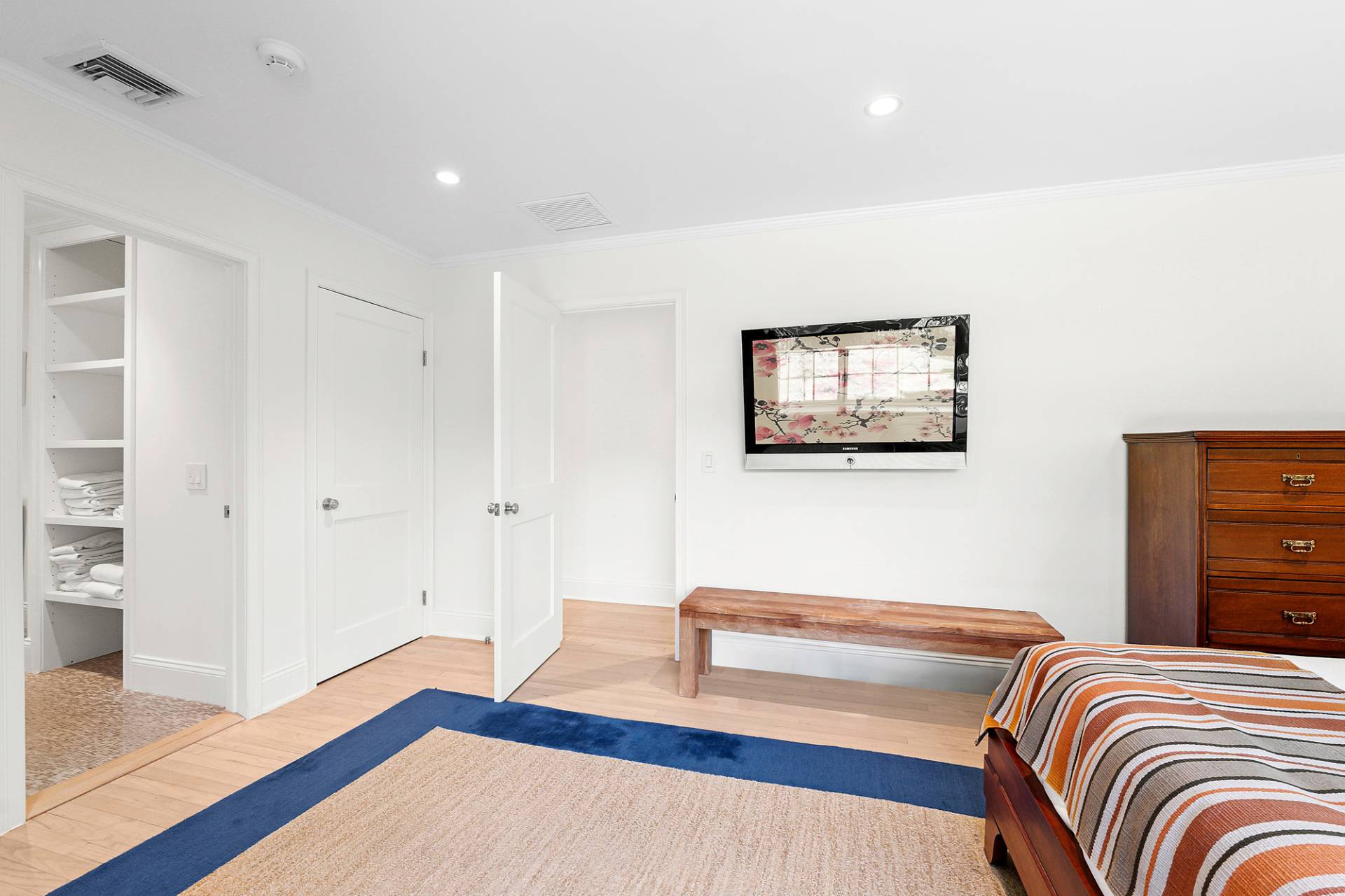 1 Egypt Close East Hampton, NY 11937 - Photo 25 of 38 a bedroom with a bed and a wooden floor