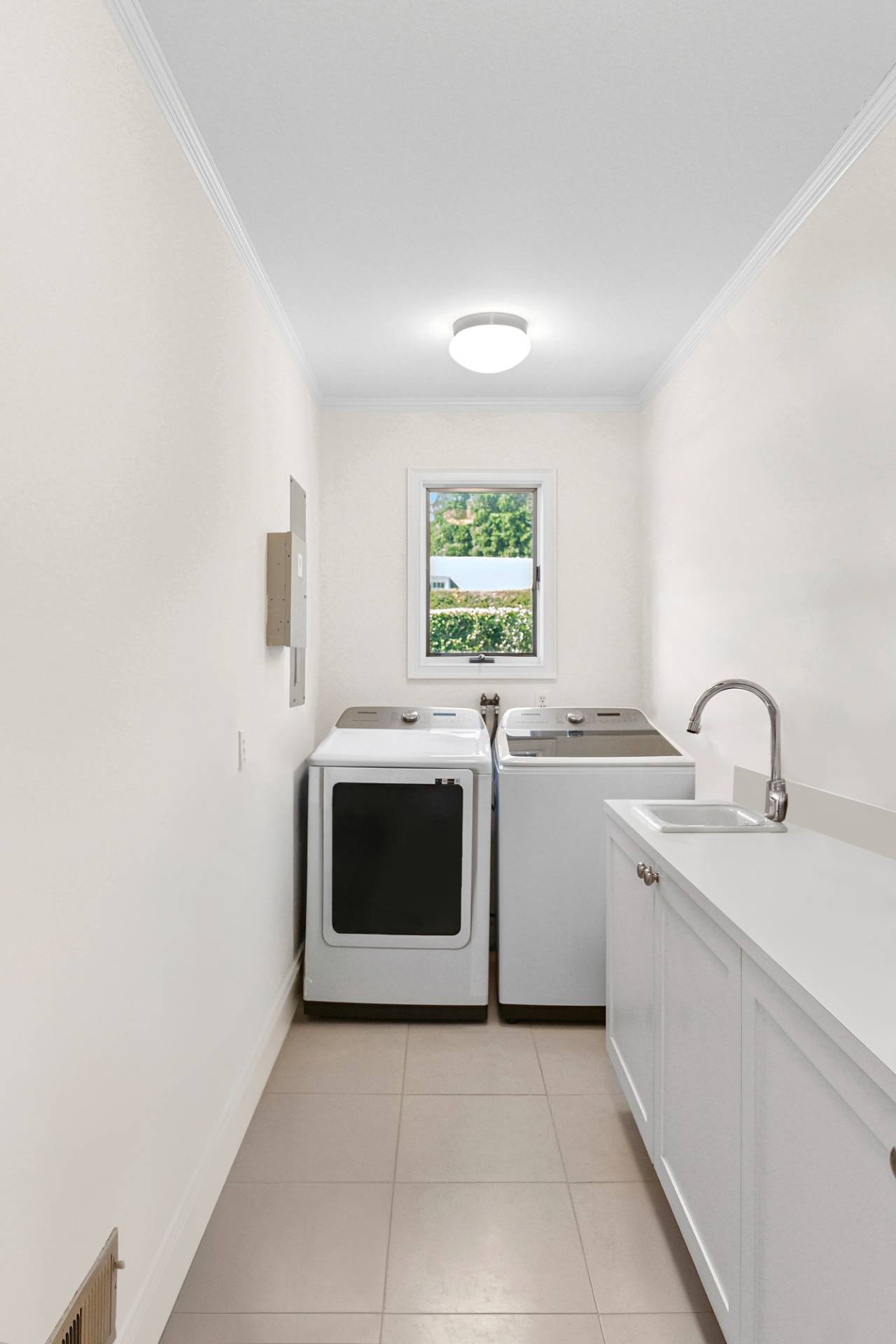1 Egypt Close East Hampton, NY 11937 - Photo 28 of 38 a utility room with sink dryer and washer