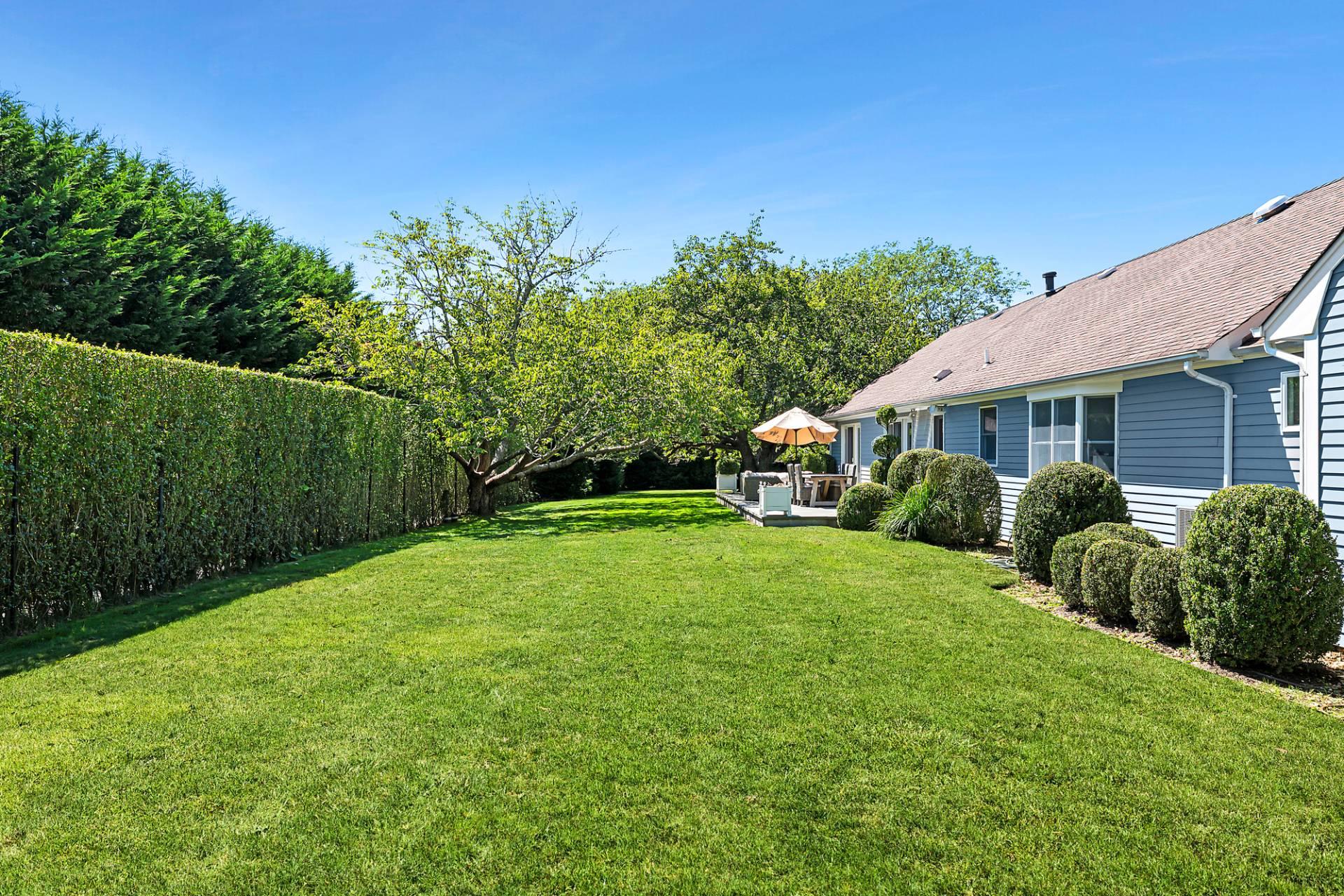 1 Egypt Close East Hampton, NY 11937 - Photo 36 of 38 a front view of a house with garden