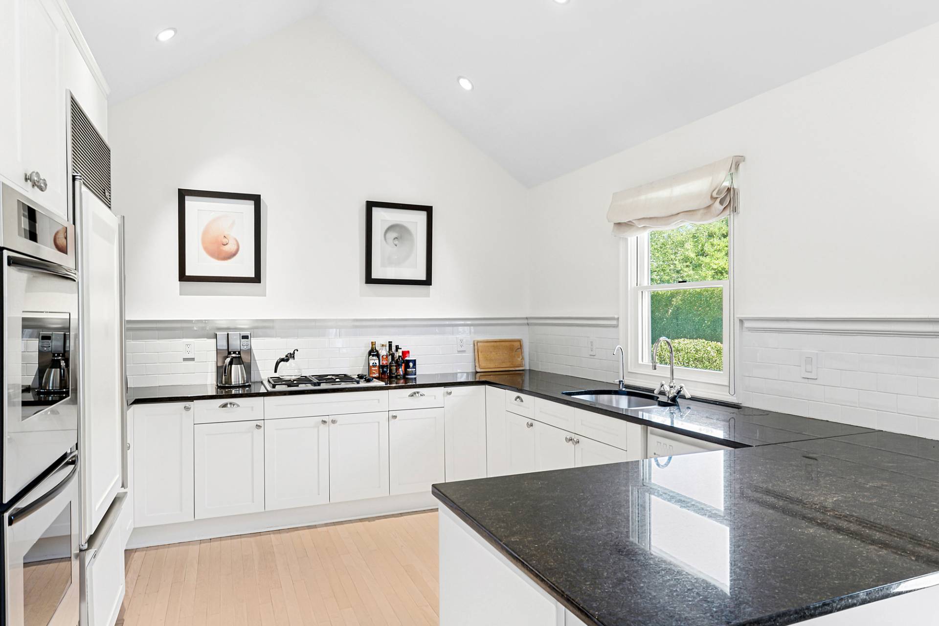 1 Egypt Close East Hampton, NY 11937 - Photo 8 of 38 a kitchen with stainless steel appliances a sink a stove a refrigerator a counter top space and cabinets