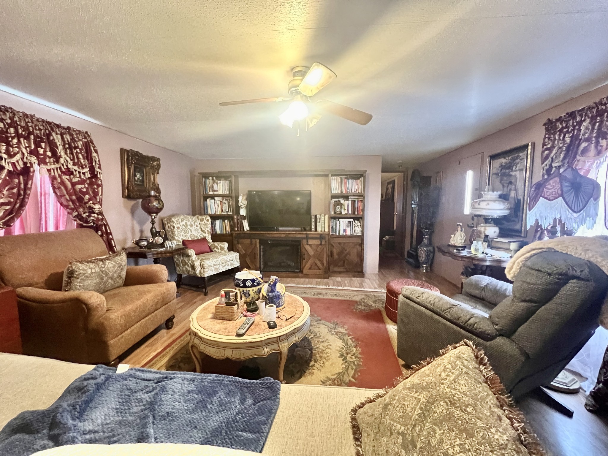 15 Red House Road Elora, TN 37328 - Photo 5 of 21 a living room with furniture and a dining table with rug