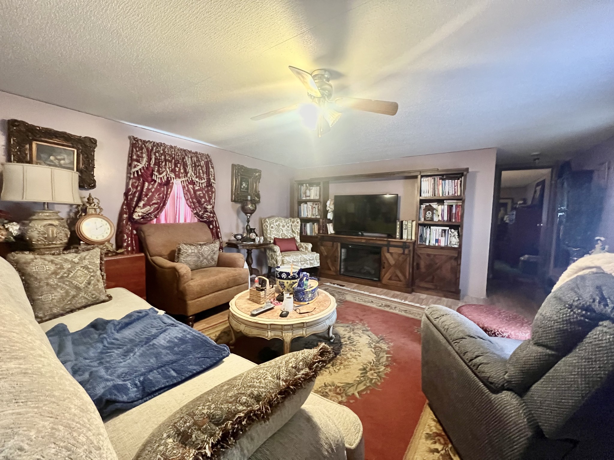 15 Red House Road Elora, TN 37328 - Photo 7 of 21 a living room with furniture and a flat screen tv