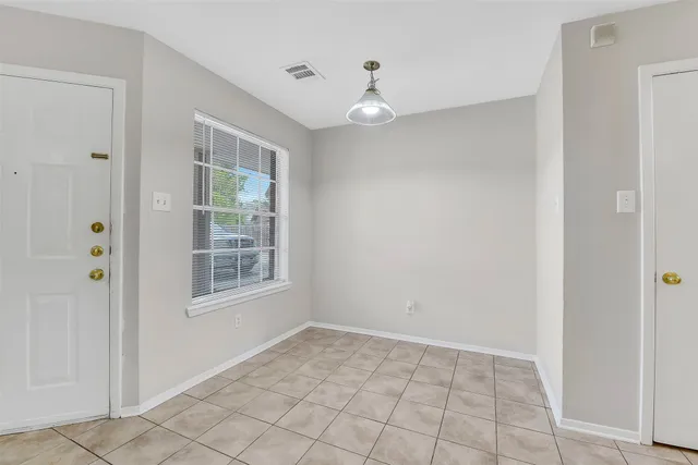 a view of an entryway with stairs