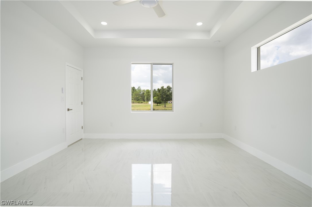 3233 Ruth Lane Lehigh Acres, FL 33976 - Photo 12 of 23 an empty room with a window