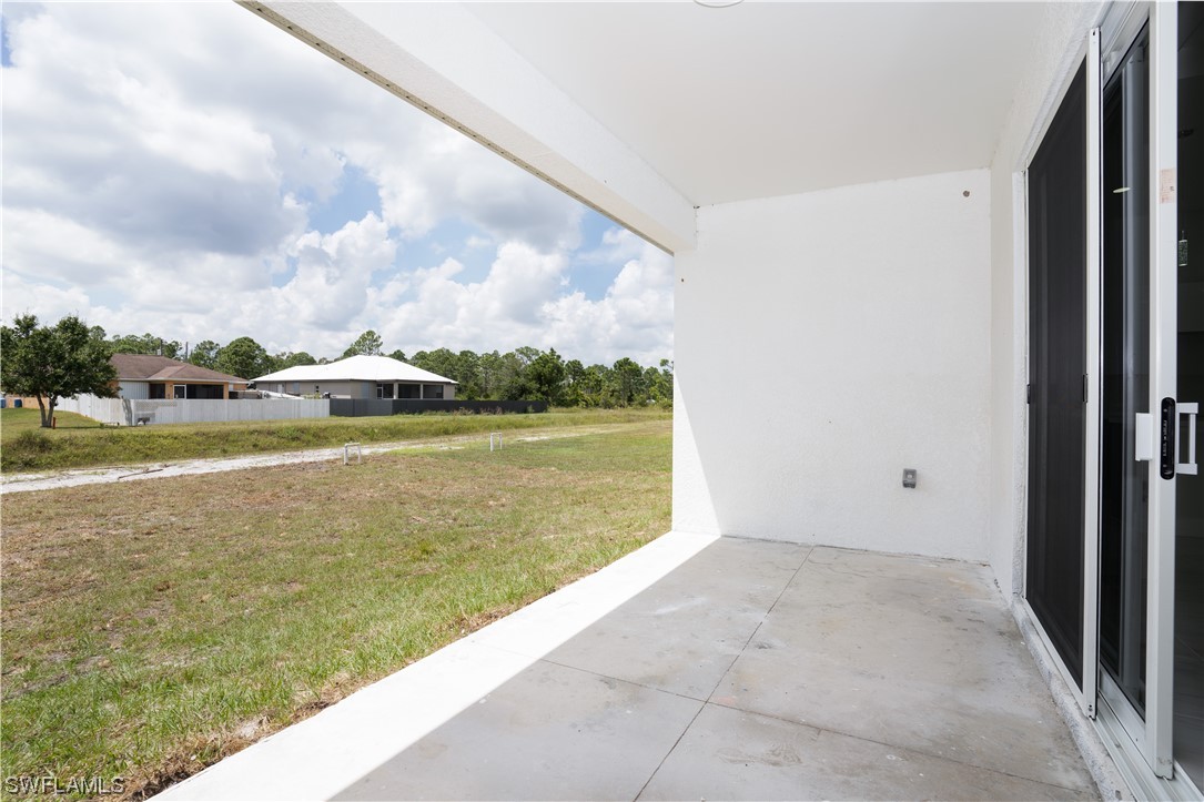 3233 Ruth Lane Lehigh Acres, FL 33976 - Photo 16 of 23 a view of an ocean from a balcony