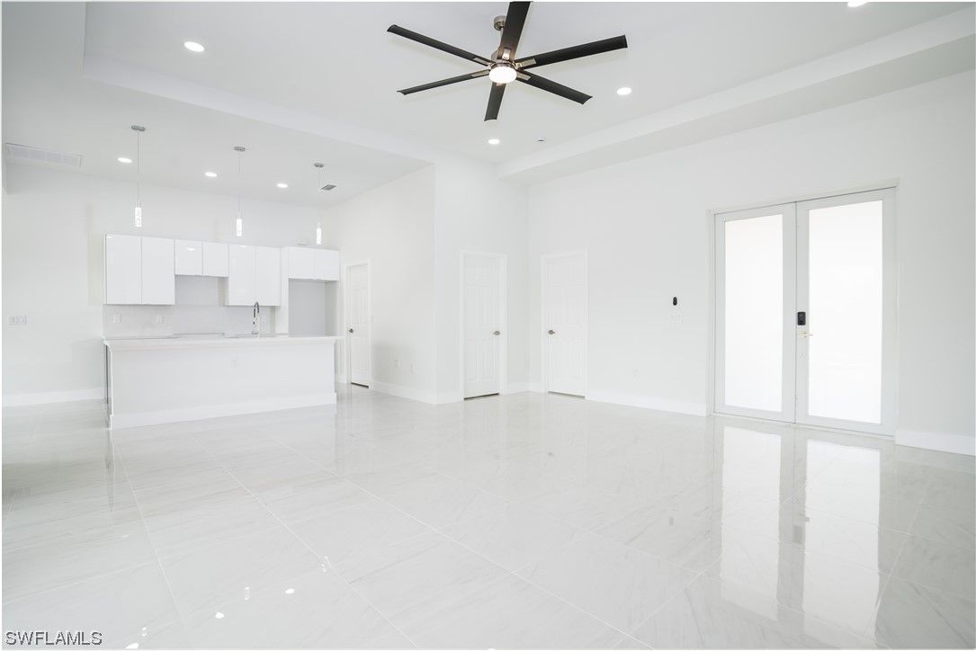 3233 Ruth Lane Lehigh Acres, FL 33976 - Photo 5 of 23 a view of a kitchen with electric appliances
