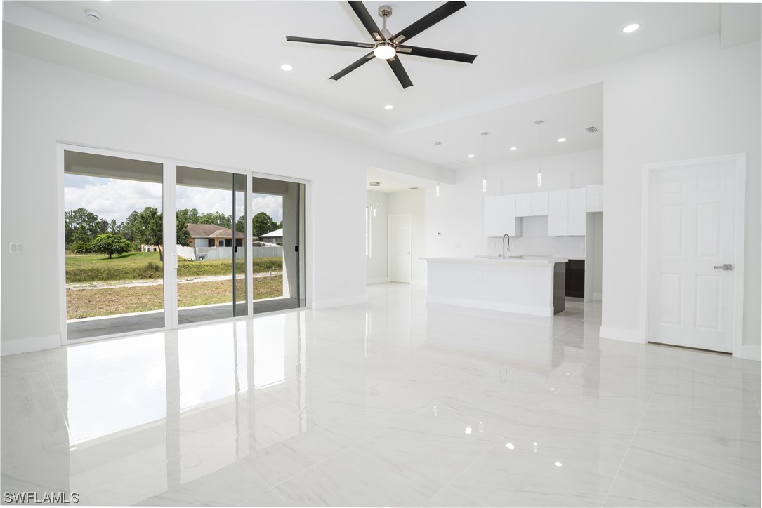 3233 Ruth Lane Lehigh Acres, FL 33976 - Photo 9 of 23 a view of a livingroom with a fireplace