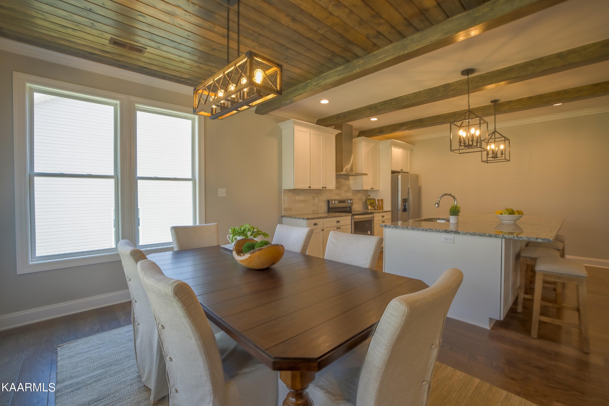 162 Tsuhdatsi Way Loudon, TN 37774 - Photo 15 of 38 a view of a dining room with furniture and a large window