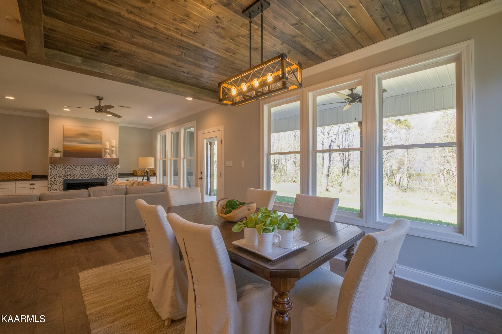162 Tsuhdatsi Way Loudon, TN 37774 - Photo 17 of 38 a view of a dining room with furniture a chandelier and wooden floor