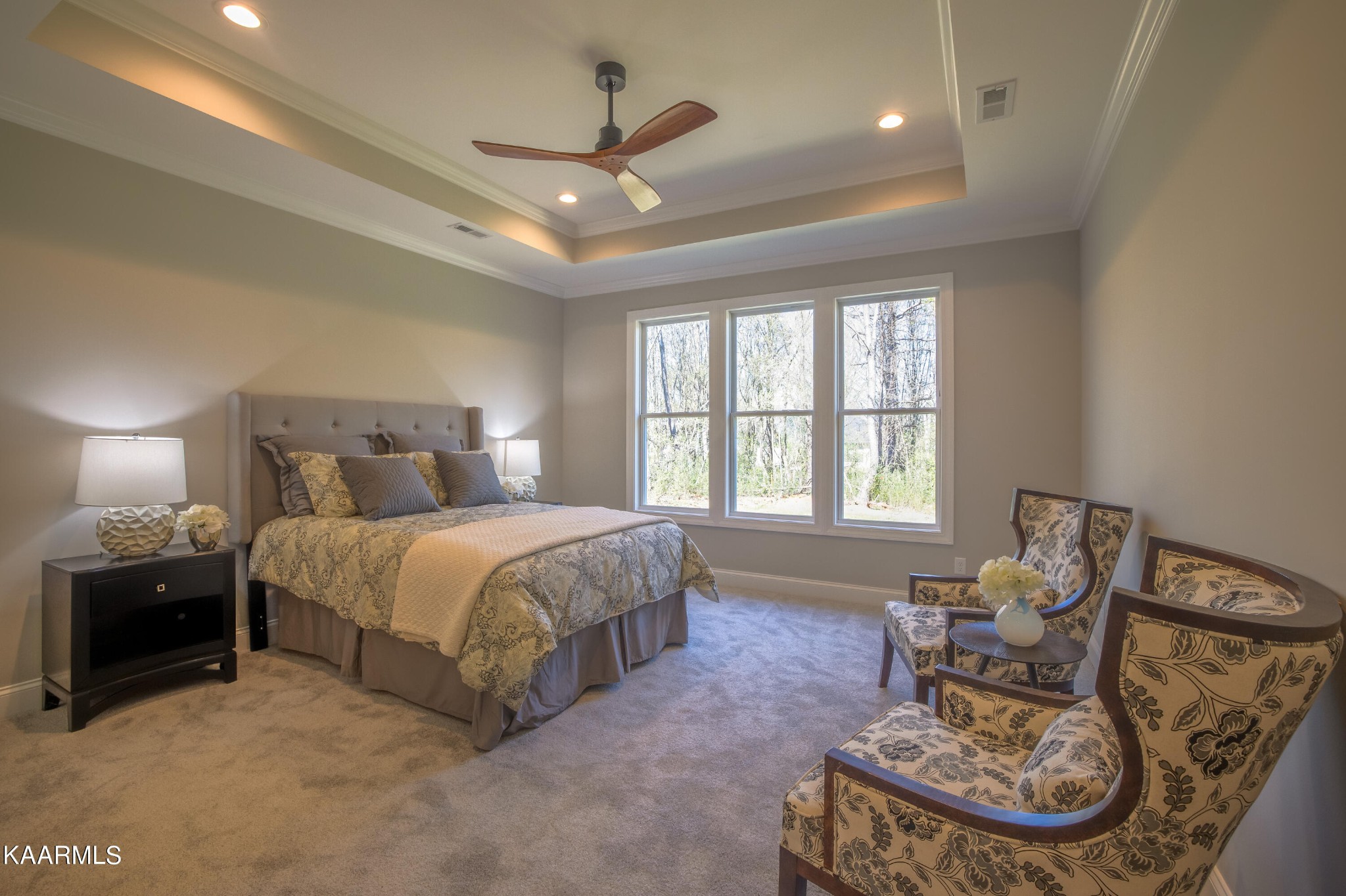 162 Tsuhdatsi Way Loudon, TN 37774 - Photo 20 of 38 a spacious bedroom with a bed and ceiling fan